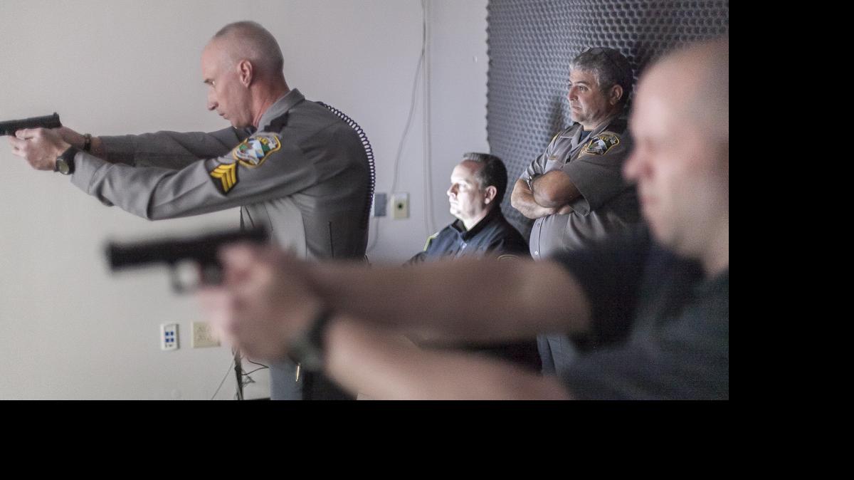 
Horry County Police Trainers demonstrate the use of the Firearms Training Simulator (FATS) system, for local media in this file photo. Horry County Council will consider fee and millage increases that would provide more officers and better pay for officers.
