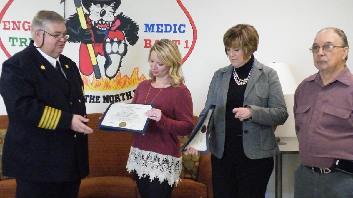 Recognized for their “neighborly acts of kindness” by Horry County Fire-Rescue Chief Joseph Tanner, (from left) are registered nurses Stacey Eddy and Becky Elmendorf. The nurses acted quickly to implement CPR to save the life of neighbor Bob Pierson (right) who went into sudden cardiac arrest while mowing his lawn last April.