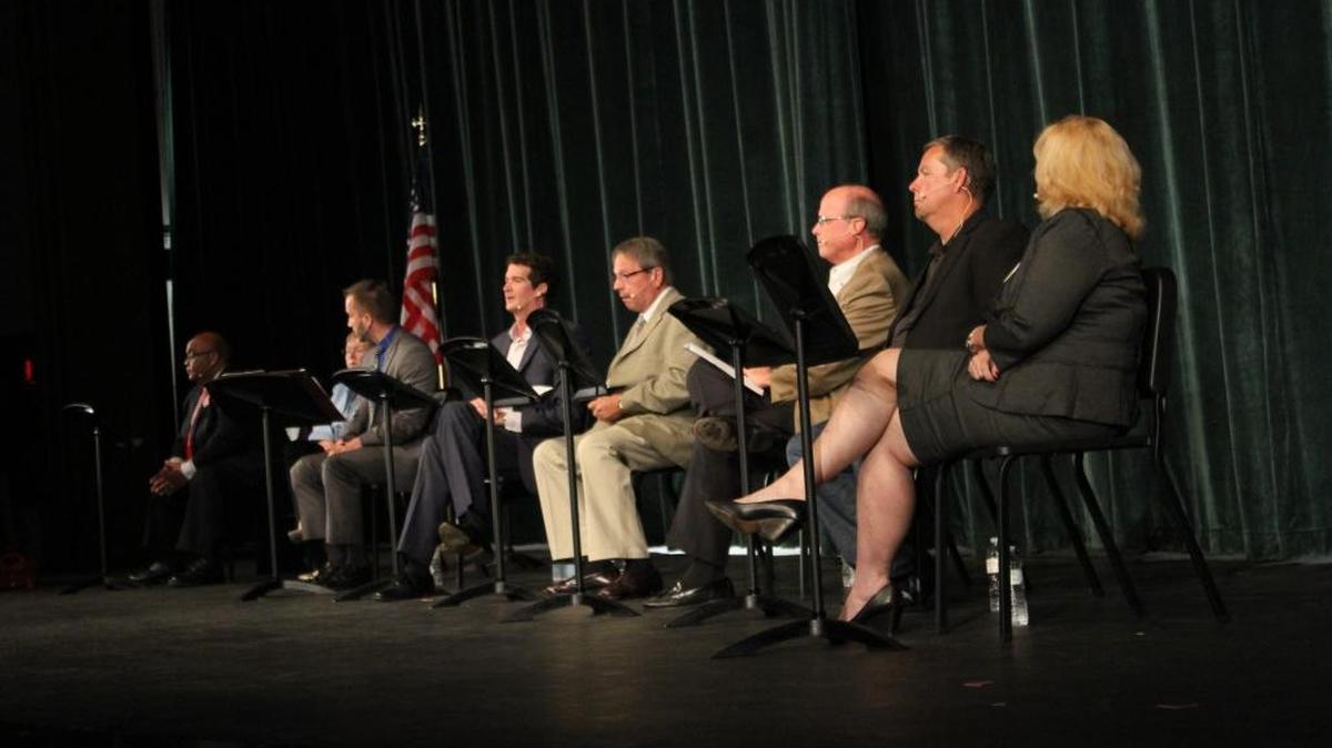 Candidates vying for three seats on Myrtle Beach City Council square off in a forum at Myrtle Beach High School on Monday night. From left, Michael Chestnut, Mary Jeffcoat, John Krajc, Mark McBride, Robert Palmer, Philip Render, Rick Sarver and Jackie Vereen.