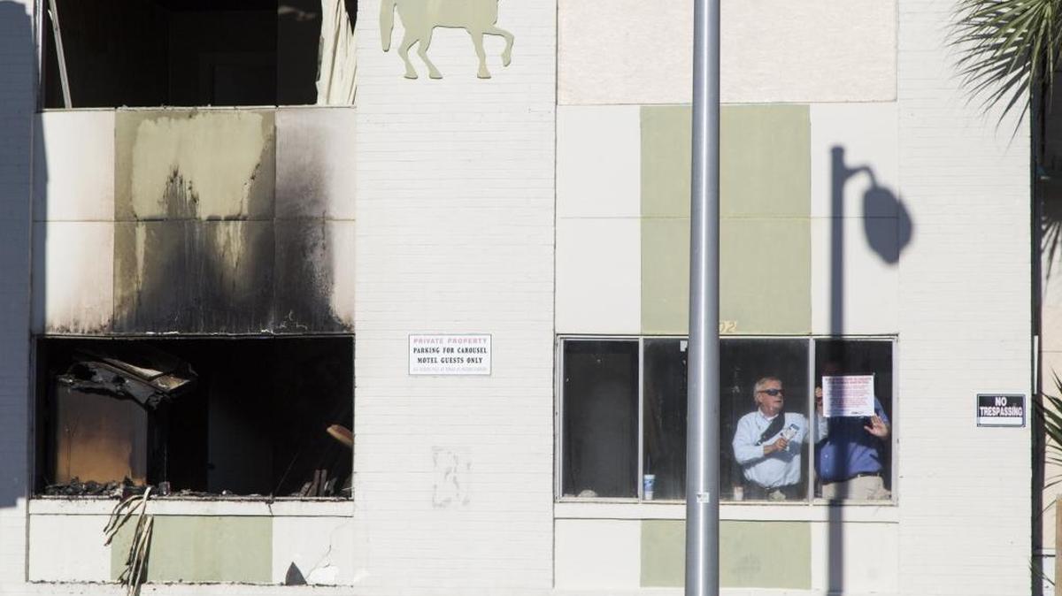 Myrtle Beach Code enforcement place signs warning "This Structure Is Unsafe for Human Habitation," on the Carousel motel at 1402 South Ocean Blvd. The Carousel was one of two vacant hotel properties to have fires on early Thursday morning. Nov. 12, 2015.