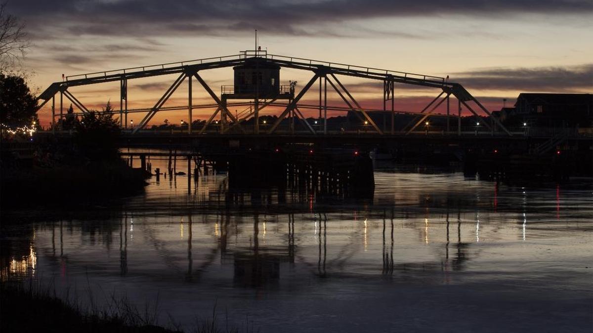 The sun sets on the Little River Swing Bridge in 2015.