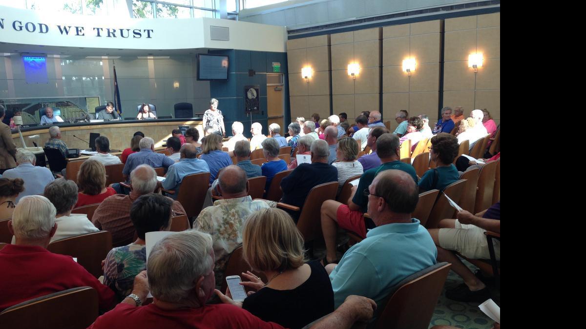 
About a hundred residents attended the Thursday night meeting at city hall, with several speaking against the business’ request. 
