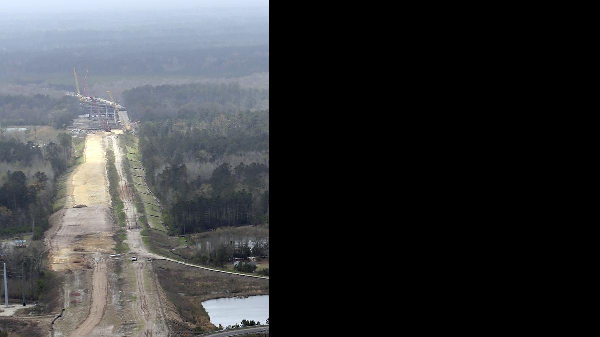 
A view of the south construction of the S.C. 31 Carolina Bays project from the air on Wednesday, March 25, 2015. Officials from NC and SC have worked to extend the highway north for nearly three decades.
