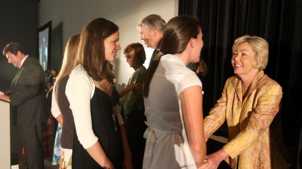 Socastee High School honor students Taryn Perry (right) and Briana Ply are congratulated by Kay Loftus, Horry County Board of Education District #4, in 2010.