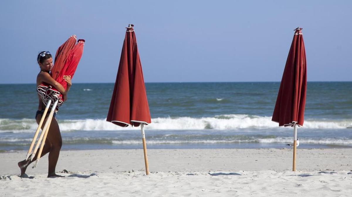 Lack’s Beach Service is being sued by Mesawet Abel, whose would-be husband and father of her four children, 41-year-old Zerihun Wolde, was pulled underwater after being caught up in a riptide on Aug. 24, 2018.