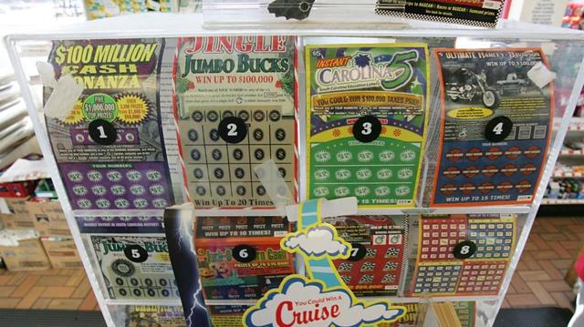 A South Carolina woman scored a winning lottery ticket while stopping for gas, officials said.