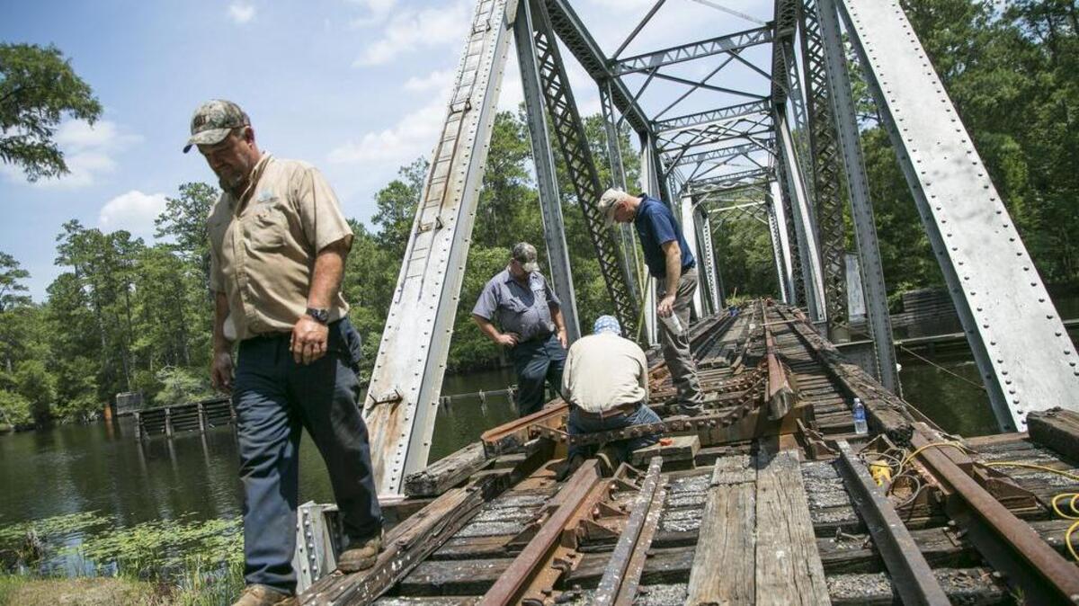 
Horry County Public Works personnel have begun work to get the trestle swing bridge over the Waccamaw River operational. R.J. Corman, the Kentucky-based firm that bought Carolina Southern Railroad, has already begun clearing brush and debris off the tracks near Conway.

