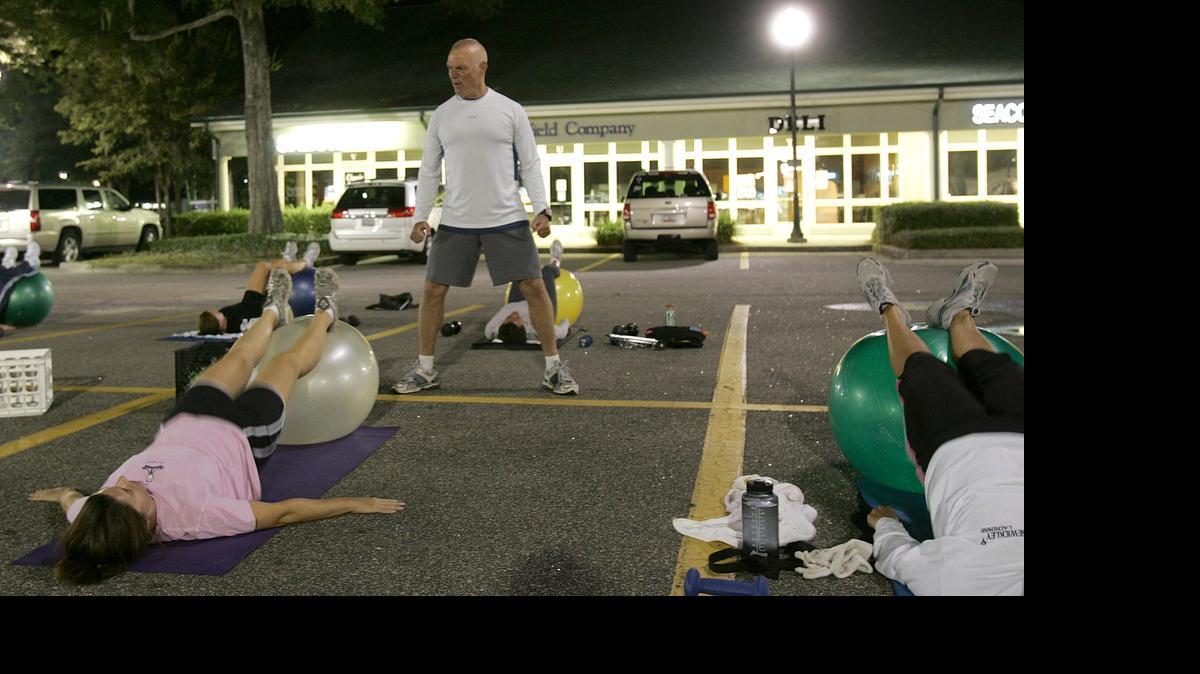 
Guy Osborne leads an early-morning workout on Feb. 23, 2010, in the parking lot of the Piggly Wiggly in Litchfield Beach. The Sun News file photo.
