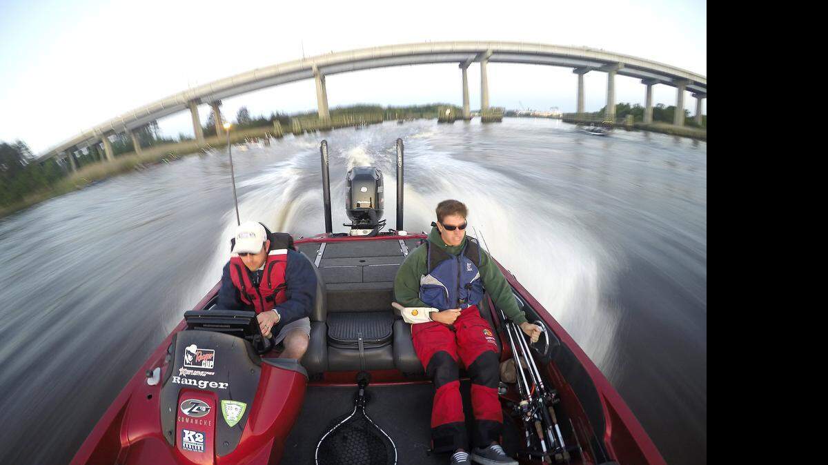 
John Proctor, left, of Conway and Colby Wells with the Alabama team launch in the B.A.S.S. Nation Southern Division Championship in Georgetown. Proctor led the first day's results with 14lbs. 9oz. and had the biggest fish of the day with a 7.9lb largemouth.
