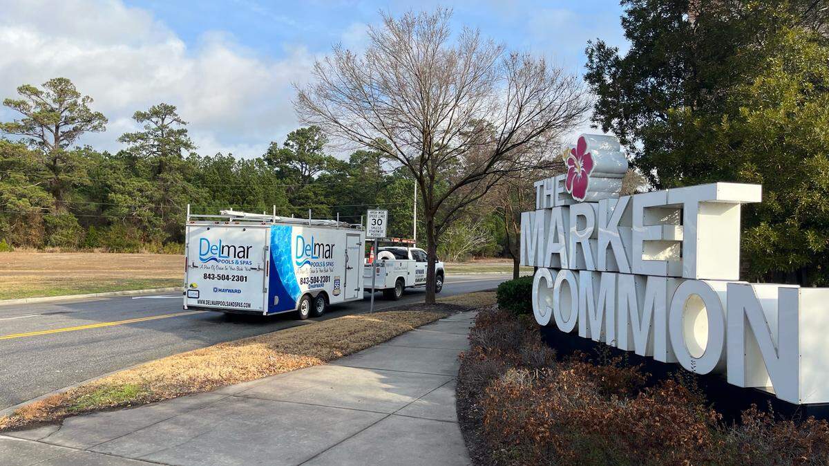 A pool maintenance vehicle drives past the Market Common’s Farrow Parkway entrance Jan. 4, 2023. The intersection could see up to 200 homes built.