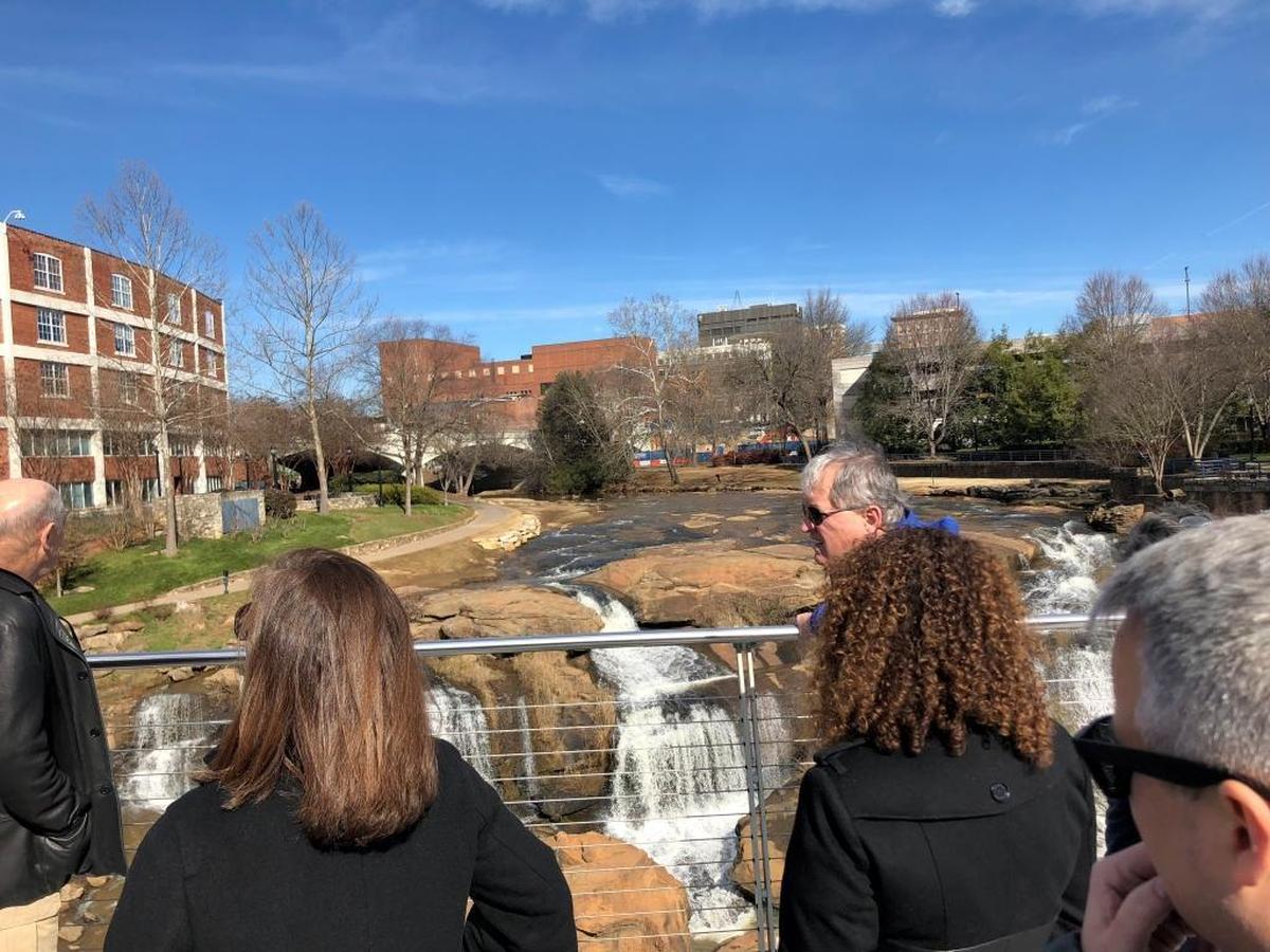 Myrtle Beach Mayor Brenda Bethune and John Pedersen, city manager, look over at the falls in Greenville.