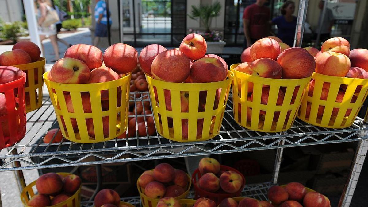 
 Produce on display at the Farmers Market on Deville Street in The Market Common. 
