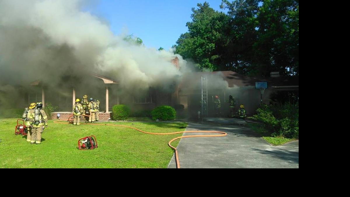 
North Myrtle Beach Fire Rescue workers assisted Horry County firefighters battle this house-fire blaze on Monday.
