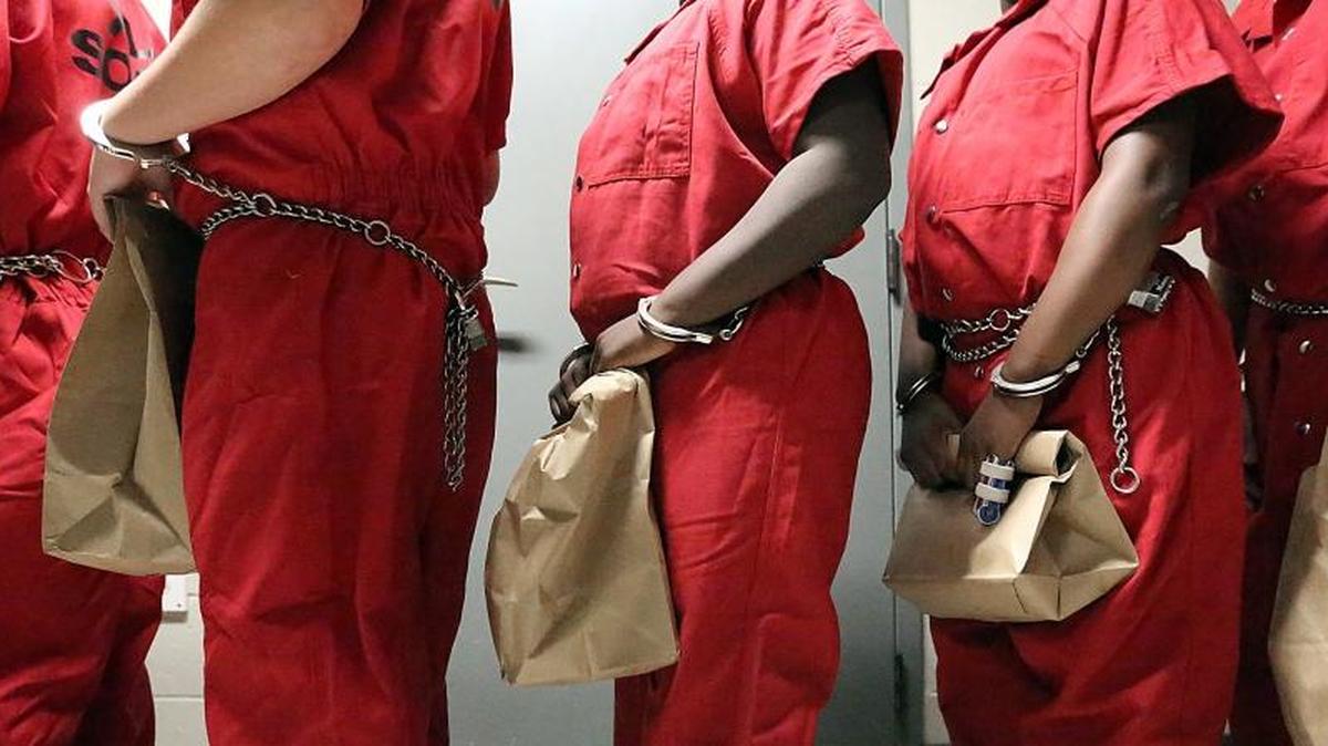 Out of their clothes and into prison jumpsuits, six boys are given a canteen and a number replaces their name at the Horry County Courthouse on Friday, Sept. 30, 2016. The boys are participating in the SOAR (Succeed Overcome Achieve Reeducate) program hosted by the Horry County Sheriff's Office. The 12-hour SOAR program incorporates law enforcement agencies from around the county. It is designed for at-risk youth to put them through physical and mental stress so they can be righted. The guardians pay a $10 fee for Horry and Georgetown county residents and a $20 fee for those in other counties.