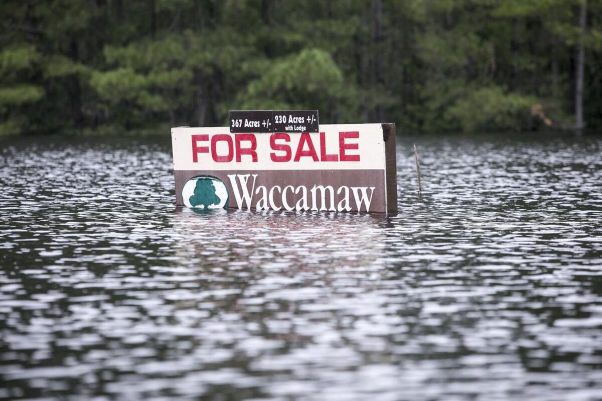 The Red Bluff community off S.C.905 has flooded along the Waccamaw River and Simpsons Creek under Hurricane Florence’s deluge with entire neighborhoods underwater. Monday, Sept. 24, 2018.