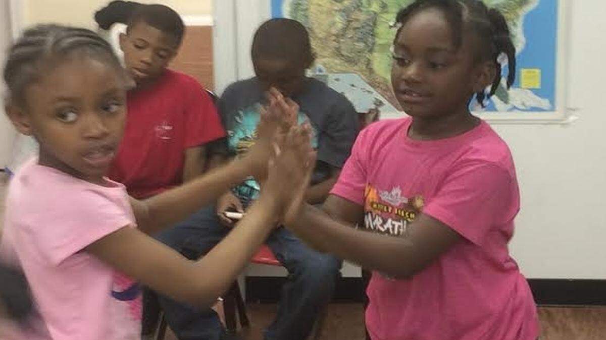 
Seven-year-old Ja’zyna Dewitt (left) enjoys the final minutes of the Racepath after school program on Thursday with 6-year-old Amani Riggins. 
