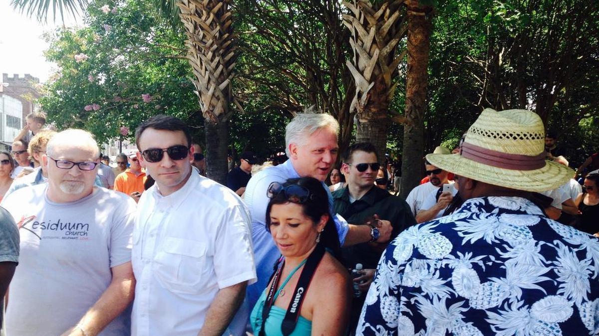 
Glenn Beck, on his way to Emanuel AME Church in Charleston, shakes the hand of a man (in the background) wearing a “Black lives matter” T-shirt.
