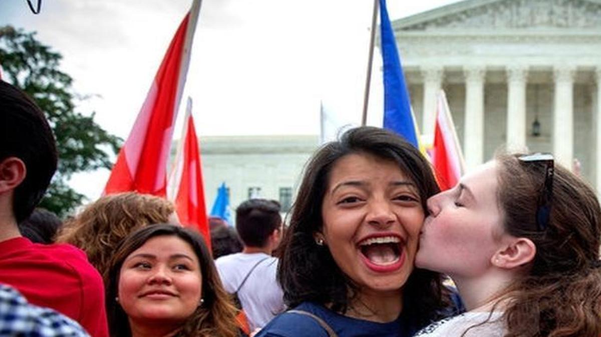 
Supporters for same-sex marriage Pooja Mandagere, left, and Natalie Thompson outside the Supreme Court following the 5-4 ruling by the court Friday. CreditDoug Mills/The New York Times
