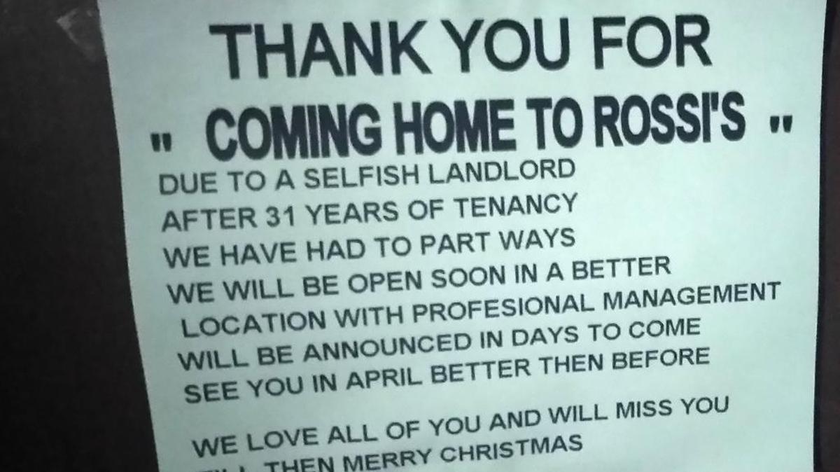 A sign details why Rossi’s Italian Restaurant isn’t currently open.