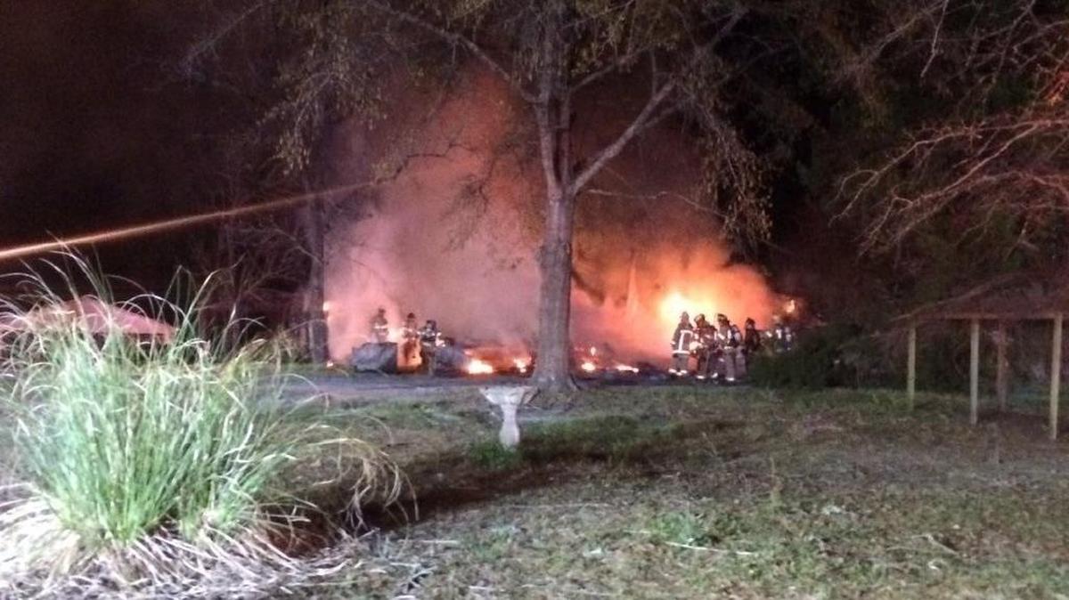 Firefighters battle fully involved structure fire at home on Rabon Road near Aynor in the early morning hours on Thursday.