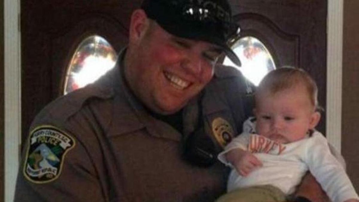 HCPD Officer KC Canterbury pictured with his nephew.
