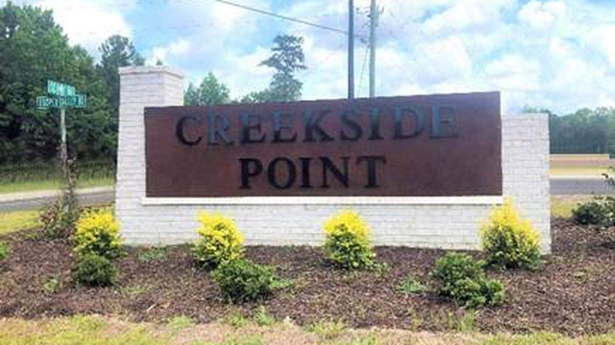 Creekside Point entrance monument located on Maya Layne Drive in Little River, South Carolina