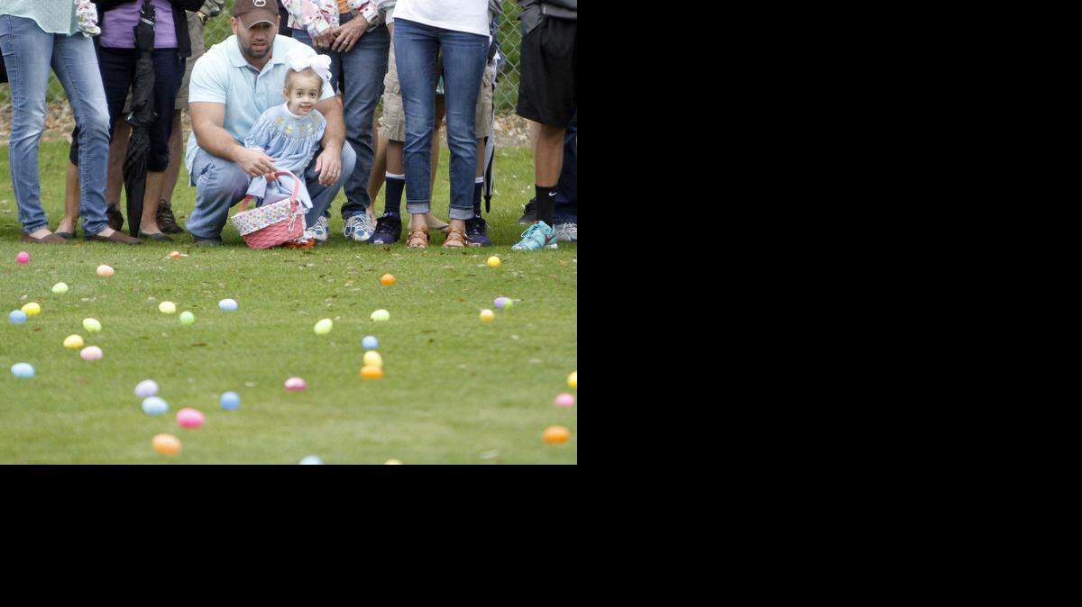 
Kinsdan Cook is ready for the 33rd annual Easter egg hunt at McLean Park in North Myrtle Beach on Saturday, April 4, 2015. Visiting from Concord, N.C., it's the second hunt for the 2-year-old. Thousands of eggs are scattered throughout the park and the hunters are divided according to age groups. At the end of the hunt, the eggs are exchanged for bags of candy so the eggs can be used again next year. Photo by Janet Blackmon Morgan / jblackmon@thesunnews.com
