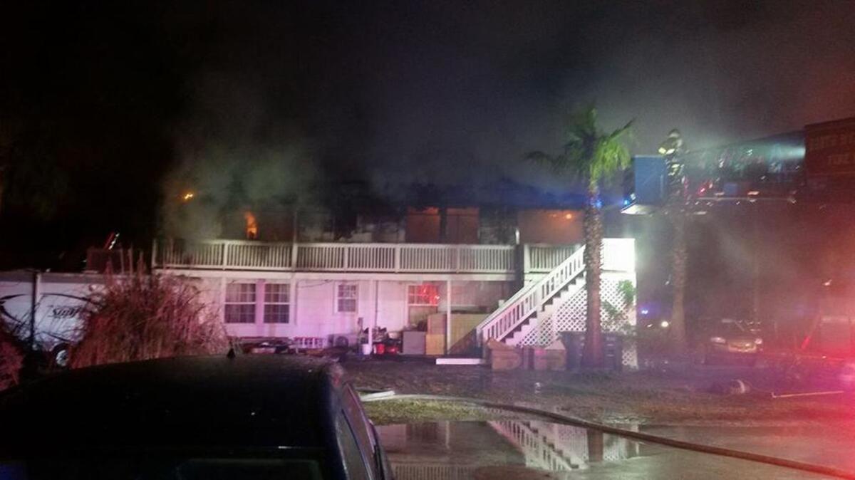 North Myrtle Beach Fire Rescue crews battled an early-morning fire on Christmas Day. Two occupants and two cats were unharmed during the fire, crews said.