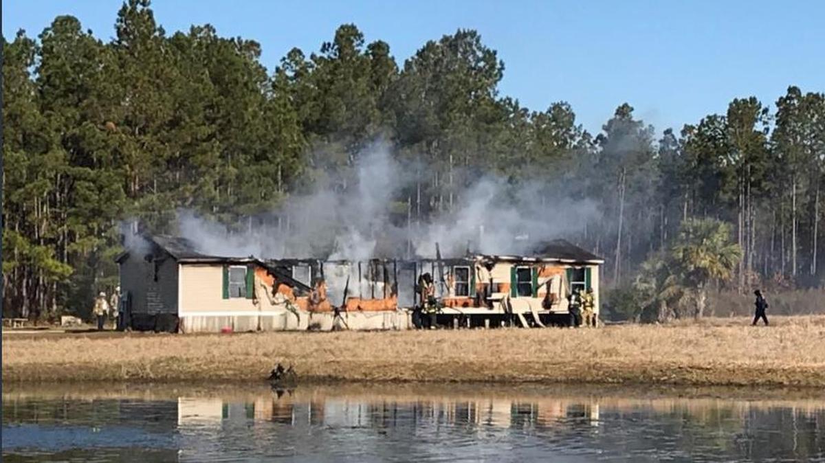 Horry County Fire Rescue firefighters battled a blaze Monday morning on the 3800 block of Green Sea Road. One man was taken to the hospital after suffering burn injuries.