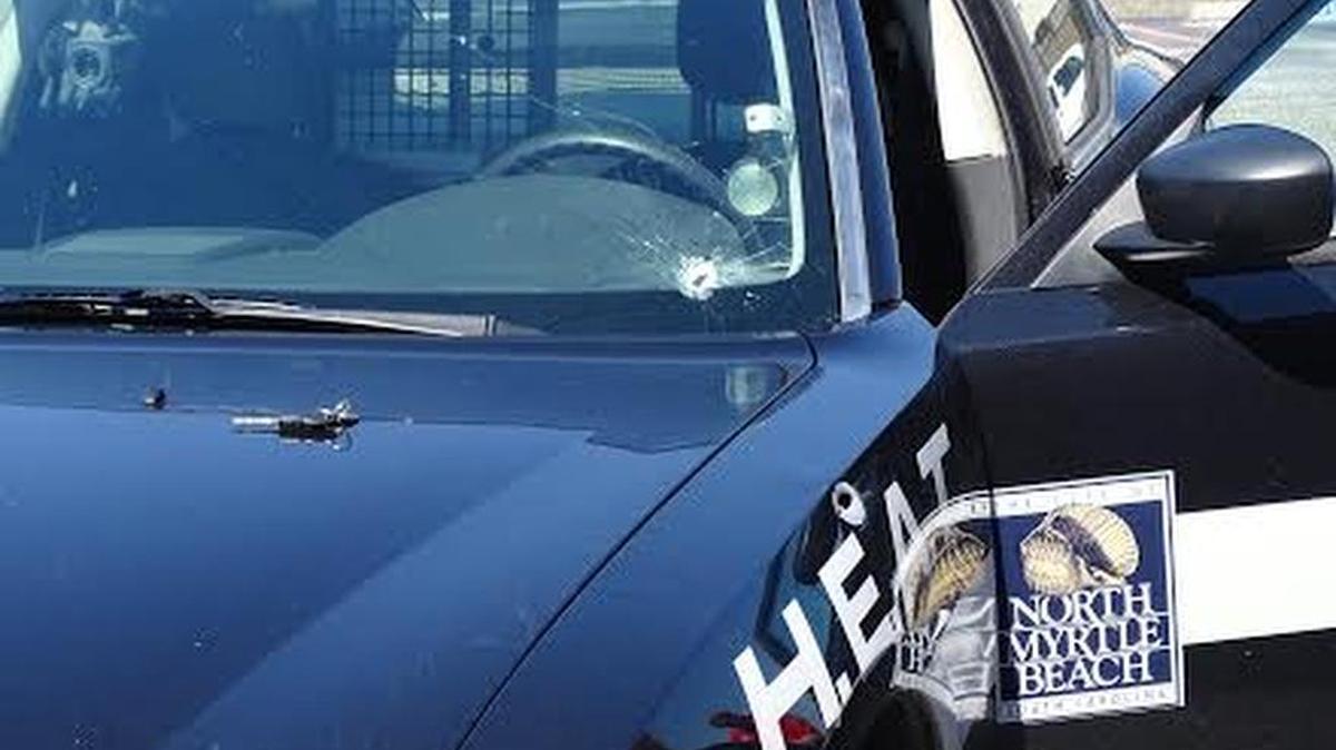 This North Myrtle Beach police car was struck by bullet as officers chased South State Bank robbery suspects on May 4.