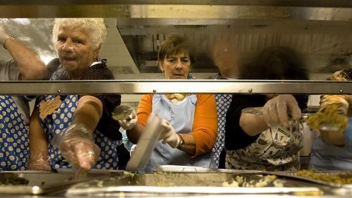 More than 100 volunteers of Swash Park Ministries prepare and serve a Thanksgiving meal in 2011 at the Community Kitchen, on Mr. Joe White Avenue in Myrtle Beach