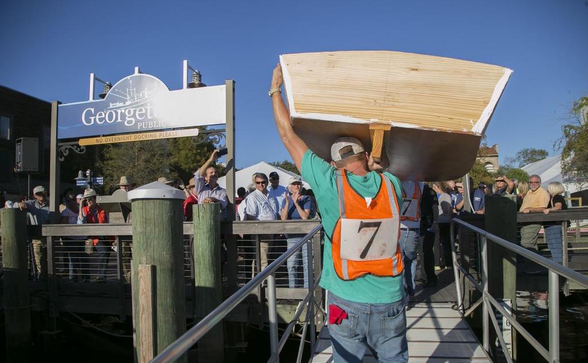 The 26th Annual Georgetown Wooden Boat Show is held this weekend where boat builders have four hours to complete a wooden skiff and race it across the river for the championship. This weekend’s show featured 140 classic wooden boats ranging in size from kayaks to yachts displayed in the water, along the boardwalk and on Front street. Maritime art, crafts, models and educational exhibits are also on display. Oct. 17, 2015.