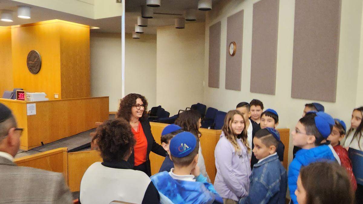 Myrtle Beach Mayor Brenda Bethune chats with Chabad Jewish Academy students during a Dec. 13, 2022 City Council meeting.