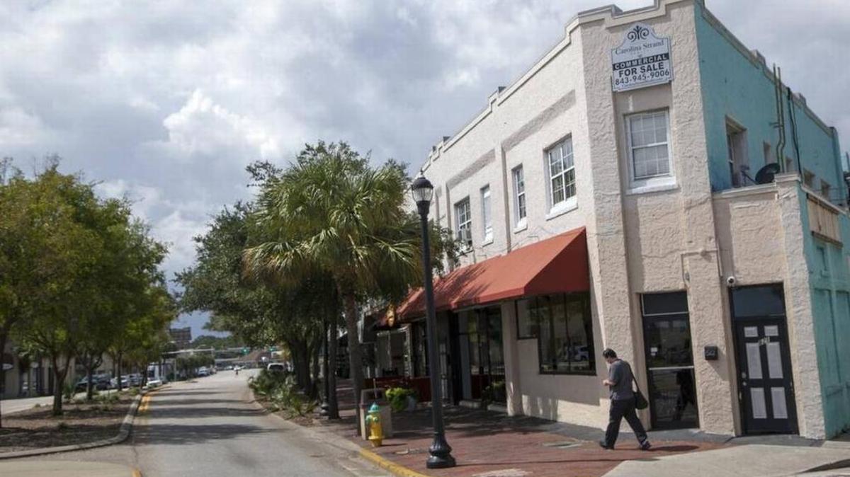 Businesses along Main Street in Myrtle Beach have very little traffic on Friday afternoon. Some downtown business owners have asked the city for improvements, complaining that trees block signage and a lack of parking hurts the area.