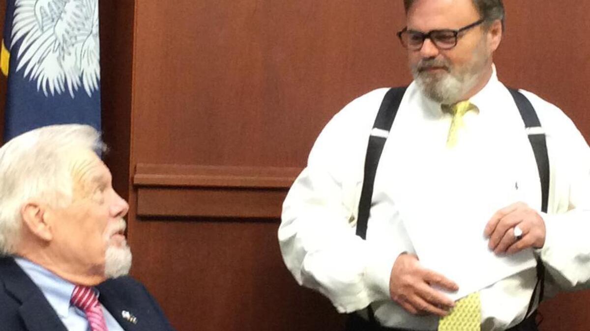 
Horry County Councilman Marion Foxworth talks with councilman Gary Loftus before Tuesday night's council meeting. 
