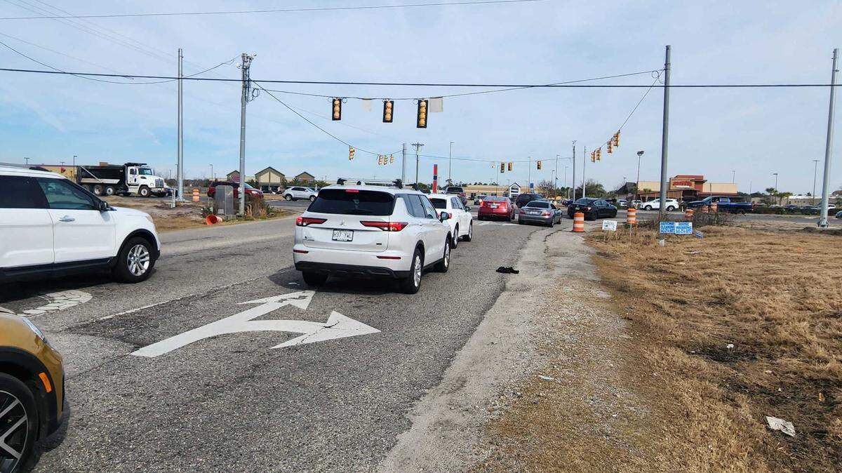 Traffic gathers along Legends Drive waiting to turn onto U.S. Highway 501 in Horry County on Jan. 11, 2023.