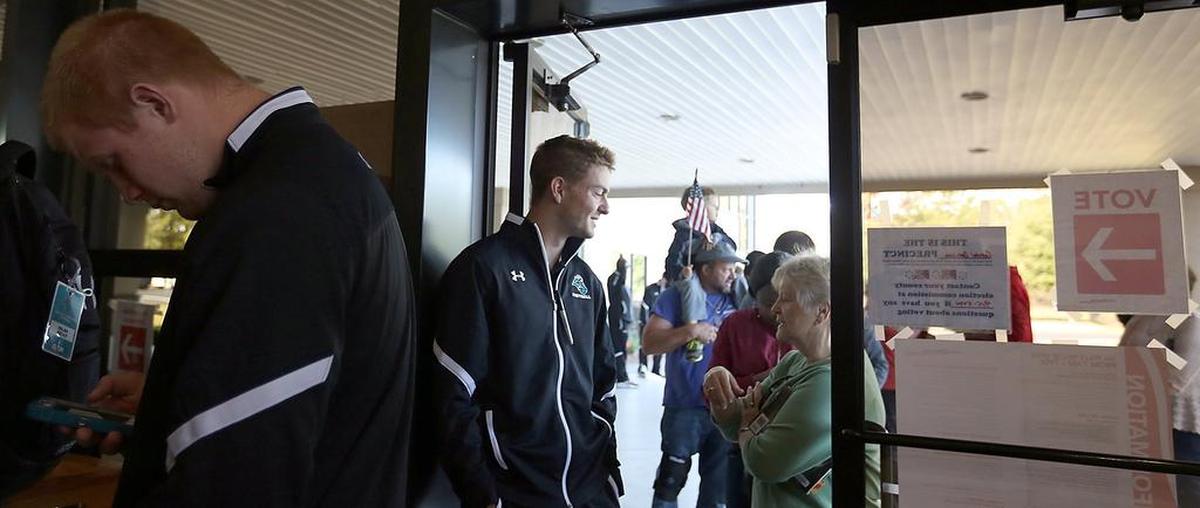 About 115 Coastal Carolina University football team members vote in the election at Christ Community Church in Conway on Tuesday, Nov. 8, 2016.