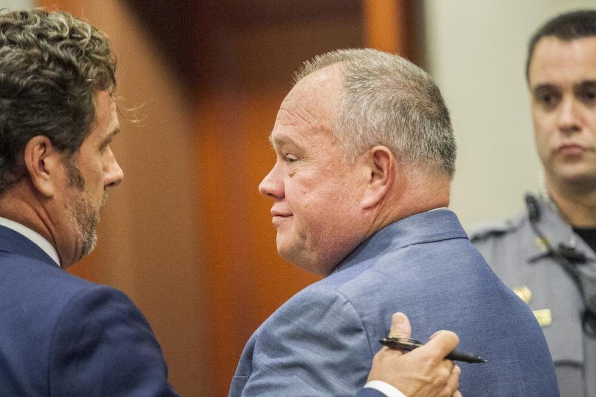 Allen Large gets advice from his attorney Russell Long after the former Horry County detective pleaded not guilty in circuit court to five counts of third-degree criminal sexual conduct and six counts of misconduct in office. 