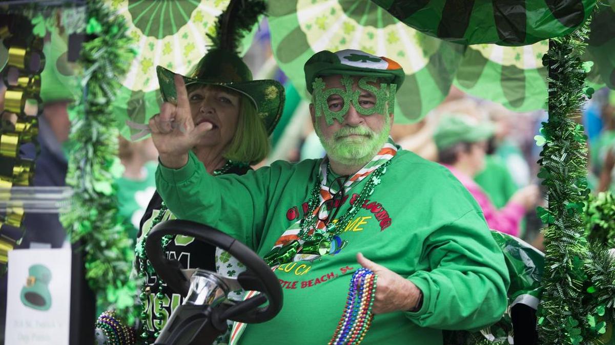 Parade revelers deck out in green Saturday during the St. Patricks Day Parade in North Myrtle Beach.