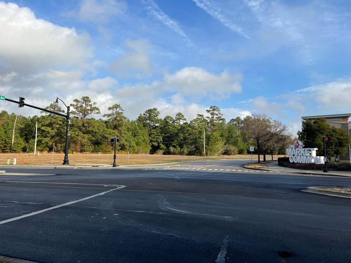 A plot of empty to the left of this photograph could host up to 200 homes as part of a new residential development inside Market Common at the intersection of Farrow Parkway and Phillis Blvd.