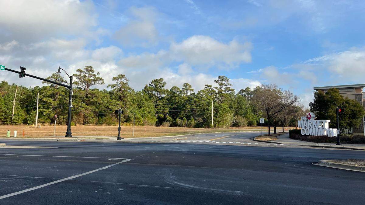 A plot of empty to the left of this photograph could host up to 200 homes as part of a new residential development inside Market Common at the intersection of Farrow Parkway and Phillis Blvd.