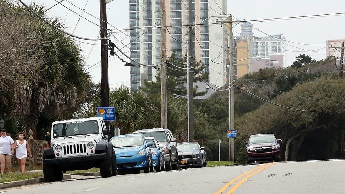 Several cars are parked near the 39th Avenue North beach access on Ocean Boulevard in Myrtle Beach on Friday. The city is considering changes to parking, speed limits and fees along “The Golden Mile.” “The Golden Mile” is on Ocean Boulevard from 31st Avenue North to 52nd Avenue North.
