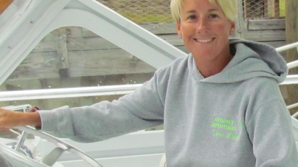 Captain Michelle Drake will guide “The Getaway” down the Intracoastal in the six-mile Intracoastal Christmas Regatta Nov. 26. The regatta is the 32nd annual boat decoration competition. “The Getaway” was the overall winner in 2015.
