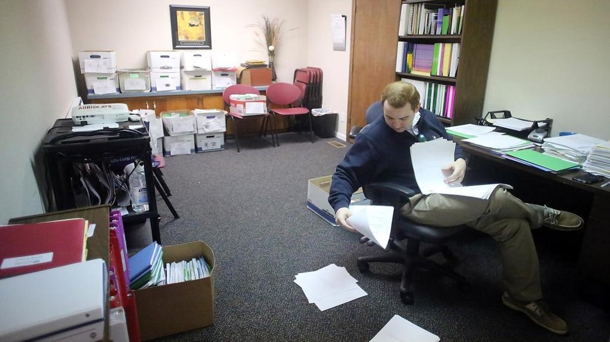 Jeff Chandonnais is an intern with the drug court program and sets up his office in a storage room as Horry County officials and Solicitor Jimmy Richardson discuss building a new facility for drug court, mental health court and pre-trail intervention programs. Chandonnais is a student at Coastal Carolina University.