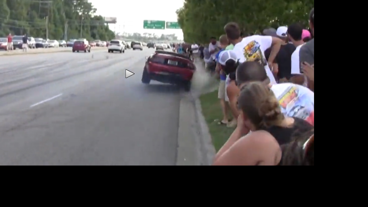 
This still image is from a video taken during Mustang Week 2014. Some erradic driving prompted the organizer and police to address the safety concerns.
