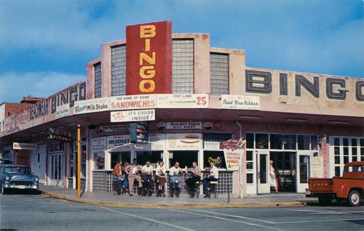 A picture of Sloppy Joe’s Bing and Cafe from 1955. Stools were available on the outside of the cafe so one could watch crowds while they ate.