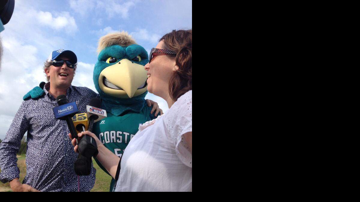
Mark Bryan of Hootie and the Blowfish with Coastal Carolina University’s mascot Chauncey during Monday After the Masters on April 13. 
