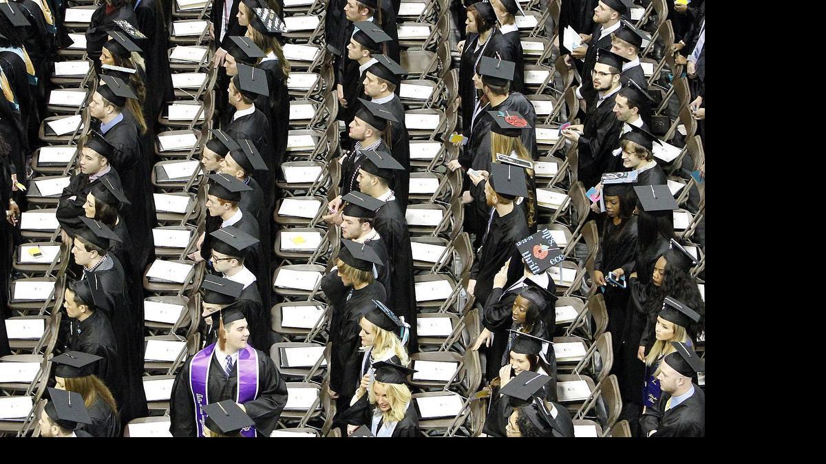 
Coastal Carolina University officials will decide Wednesday if this weekend’s commencement will proceed as scheduled. A storm system moving up the East Coast may force the school to hold four services indoors at the HTC Center. In this photo, a record-breaking number of winter graduates, 455, fill the seats in the 2014 commencement ceremony at the HTC Center on Dec. 13, 2014. Photo by Janet Blackmon Morgan / jblackmon@thesunnews.com
