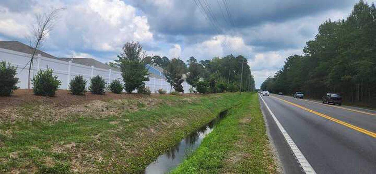 A thin tree line fronts The Reserve at Wild Horse, a subdivision in Horry County, S.C. that opened in 2022.