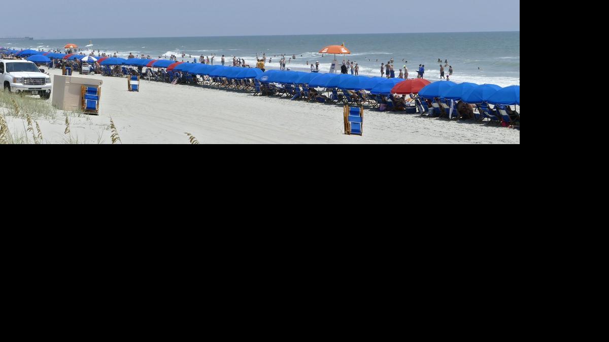 
A wall of beach service umbrellas lines the sand starting at the 82nd Avenue North beach access and going north. Myrtle Beach is making some changes to the surfing zones but will still not allow surfing in this crowded commercial area north of 82nd Avenue North.
